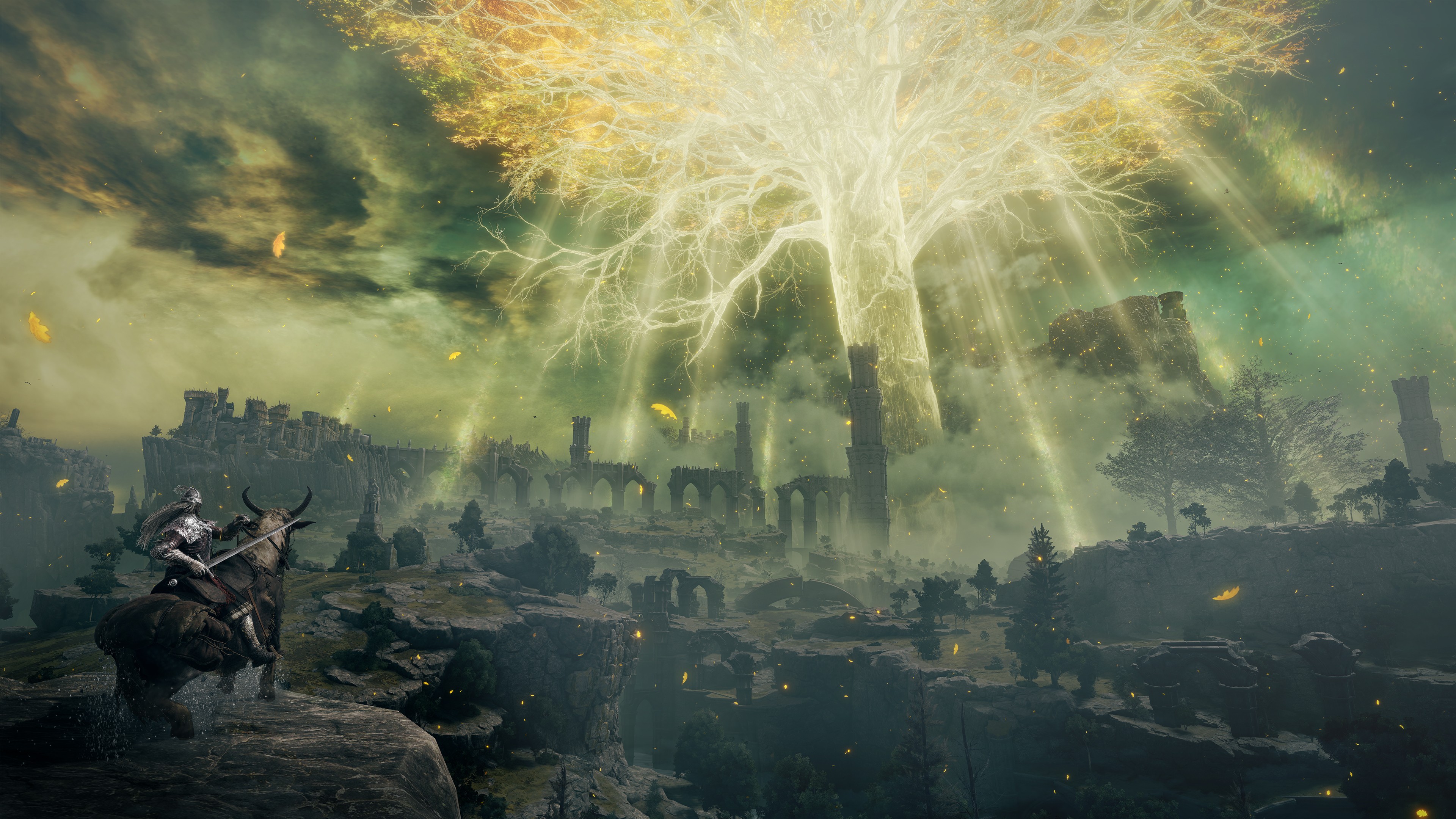A warrior overlooks ruined castles and the golden Erdtree of Elden Ring